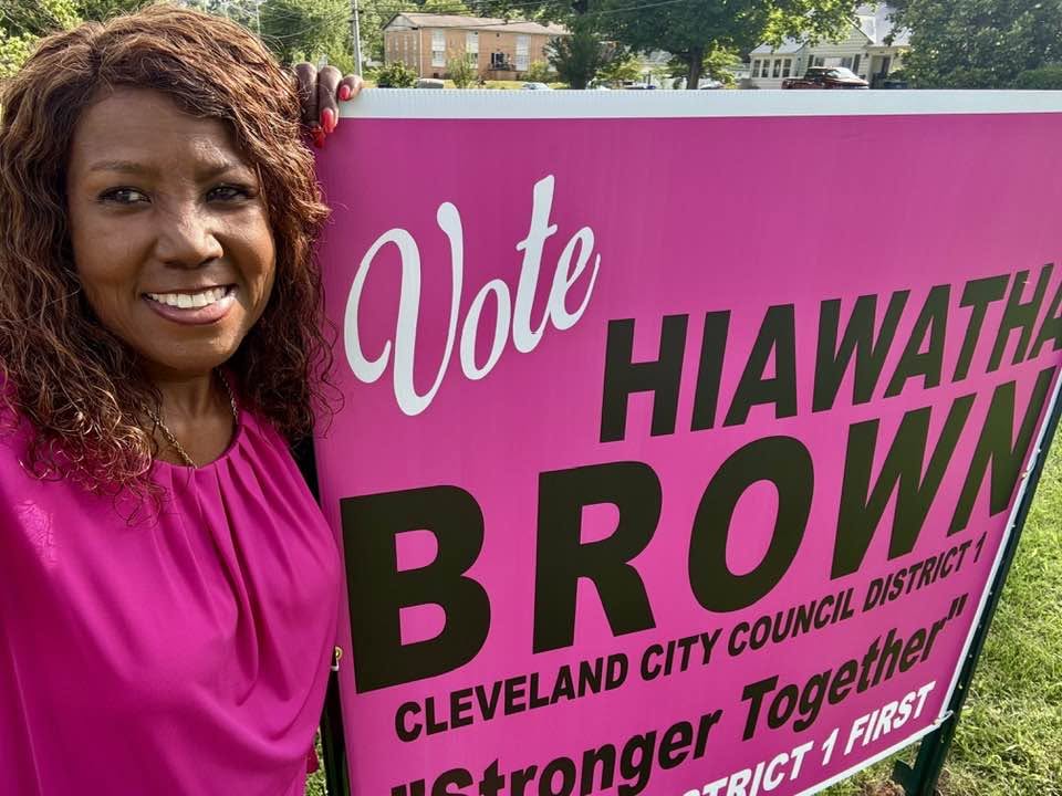 Hiawatha Brown putting up yard signs!